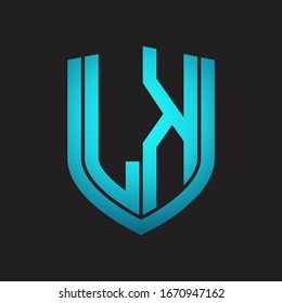 LK Logo monogram with emblem shield design isolated with blue colors on black background