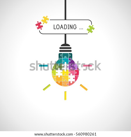 Loading idea concept with light bulb made of colorful puzzle pieces