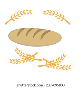 A loaf of fresh bread and spike of wheat isolated by white background.