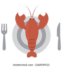 lobster on a plate with fork and knife