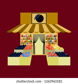 Local fruit and vegetables store building. Groceries crates in front of storefront