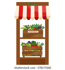 Local vegetable stall. Fresh organic food products shop on shelves. Local market farmer selling vegetables produce on his stall with awning. promote healthy eating concept. Food market.