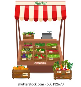 Local vegetable stall. Fresh organic food products shop on shelves. 