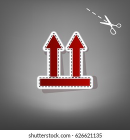 Logistic sign of arrows. Vector. Red icon with for applique from paper with shadow on gray background with scissors.