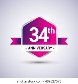 Logo 34th anniversary celebration isolated in red hexagon shape and blue ribbon colored, vector design.