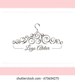 The logo Atelier. Vector template for the fashion industry. Element for Studio sewing and tailoring. Illustration in modern style