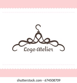 The logo Atelier. Vector template for the fashion industry. Element for Studio sewing and tailoring. Illustration in modern style