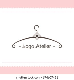 The logo Atelier. Vector template for the fashion industry. Element for Studio sewing and tailoring. Illustration in modern style