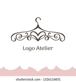 Logo for Atelier, wedding boutique, women's dress shop. Vector template of the brand for the fashion designer. Stylized clothes hanger made of twisted lines and heart