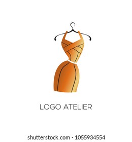 Logo for Atelier, women's clothing store. Vector template of the brand for the fashion designer. Element for Studio sewing and tailoring. Gold bandage dress with black lines