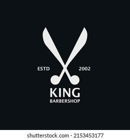 logo of a barbershop with classic scissors shape
