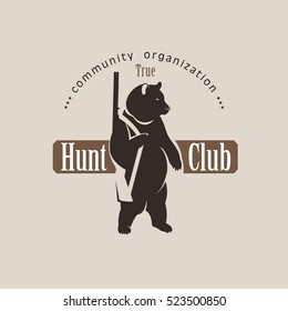  Logo bear with a gun. Vector logo of a hunting club. 