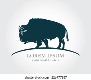 logo as a blue buffalo on a gray background with the slogan