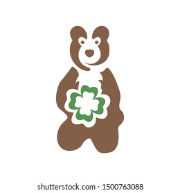 The logo is a brown bear with a clover in the form of hearts.