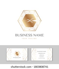 The logo and business card for Atelier, fashion designer or studio sewing and tailoring. Gold polygon with with scissors