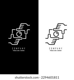 logo camera in the hands of the photographer