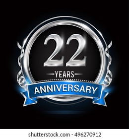 Logo celebrating 22 years anniversary with silver ring and blue ribbon.