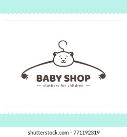 Logo for children's clothing shop. Vector template of the brand for the designer. Element for Studio sewing and tailoring. Vector illustration of a hanger and a bear in cartoon style