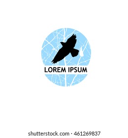 Logo circle of tree branches with a bird. Vector