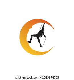 Logo climber climbing the moon, symbol of rock climbing