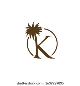 logo coconut tree with letter k vector design