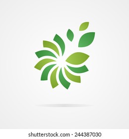 Logo combination of a flower and leaf.