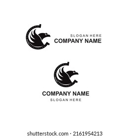 logo for company horseshoe with eagle bird round