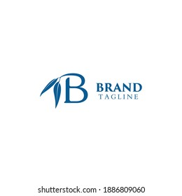 logo concept for the initials letter B with a leaf at the end for an eco-friendly furniture business