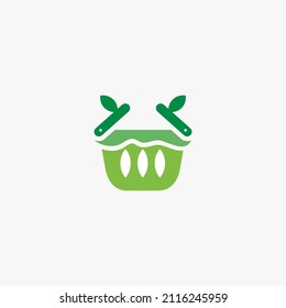 logotipo compuesto por bolso de compra y color verde hoja aislado en el fondo de la tienda fresca de la granja, tienda de alimentos veganos, mercado de productos naturales, producto orgánico.