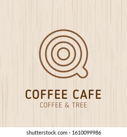 Logo design for Coffee Cafe, Coffee Shop on wood background : Tree annual rings and top view of coffee concept