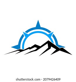 A logo design concept with mountain and compass to represent something related to outdoor