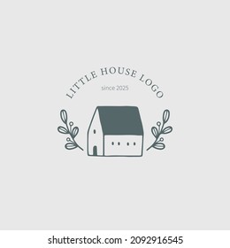 Logo design with hand drawn little house and branches