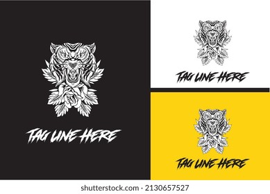 diseño del logotipo del tigre de cabeza y del vector de flor negro y blanco