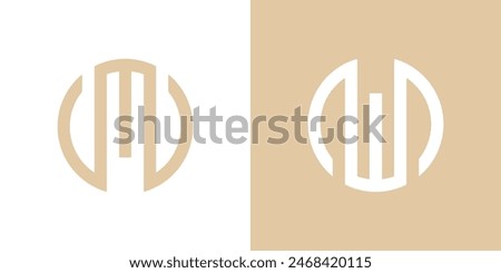 Logo design initial letters M and W circle shape. Premium Vector