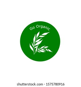 Logo design. Leaves illustration with text go organic in the green circle on white color background.