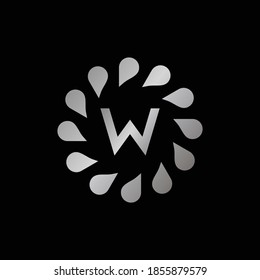 Logo Design for Letter W. Silver Letter W logo design isolated on black background.Silver Vector jewelry concept.