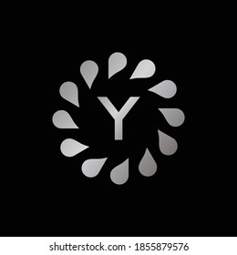 Logo Design for Letter Y. Silver Letter Y logo design isolated on black background.Silver Vector jewelry concept.