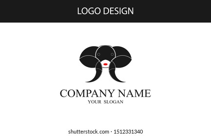 logo design with a sheep's head with large horns. simple, golden ratio method, black and white.