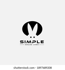 Logo design template, with cute rabbit icon in black, negative space