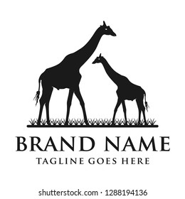 the logo design of two black male giraffes