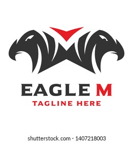 logo design of two eagle animal heads with the letter M