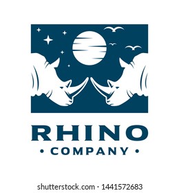 logo design of two rhinoceros heads