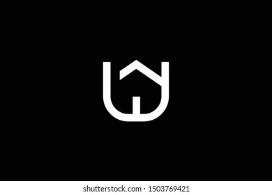 Logo design of W UW WU in vector for construction, home, real estate, building, property. Minimal awesome trendy professional logo design template on black background.