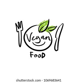 Logo with the designation of Vegan. The image of a plate and edible leaves.