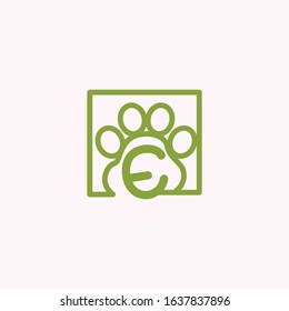 logo dog paw with letter e vector design