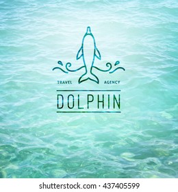 logo of dolphin and waves, vector template for travel agency