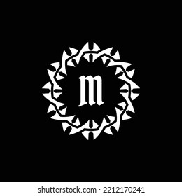 logo emblem circle letter M. Gothic emblem that seems mysterious and intimidating.