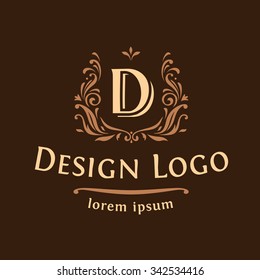 Logo emblem with the letters, dark background.