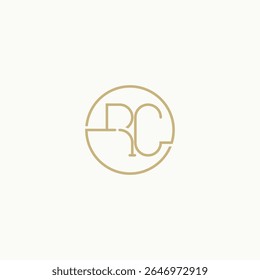 O logotipo apresenta o monograma "RC" harmoniosamente integrado dentro de um círculo fino em ouro macio. Este design parece exclusivo.