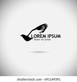 Logo flying bird. Vector